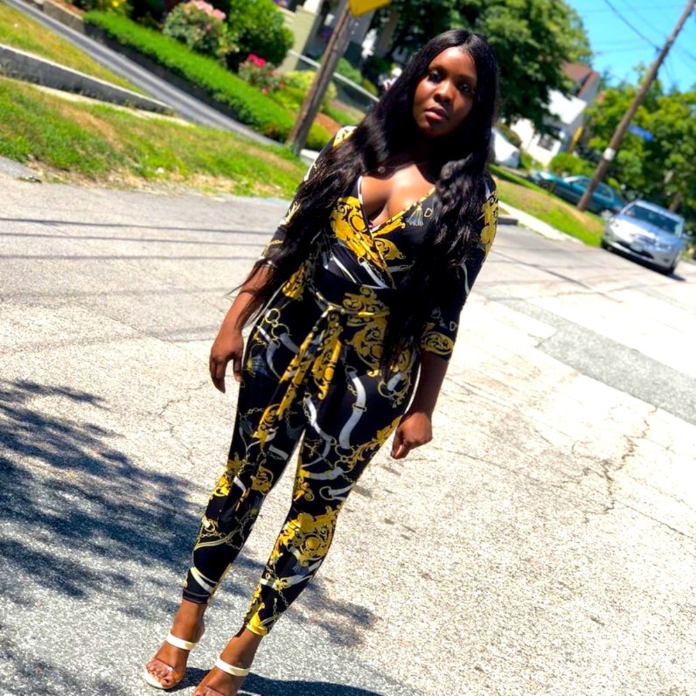 One piece jumpsuit with plunging neckline